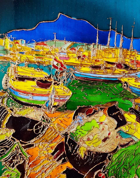 Yellow and red fishing boats crowd green harbor water beneath a deep-blue headland, while rocks outlined in copper tones anchor the foreground