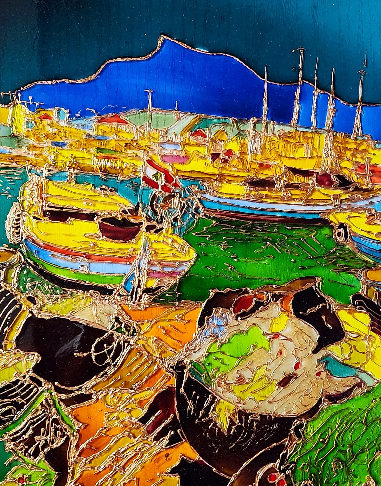 Yellow and red fishing boats crowd green harbor water beneath a deep-blue headland, while rocks outlined in copper tones anchor the foreground