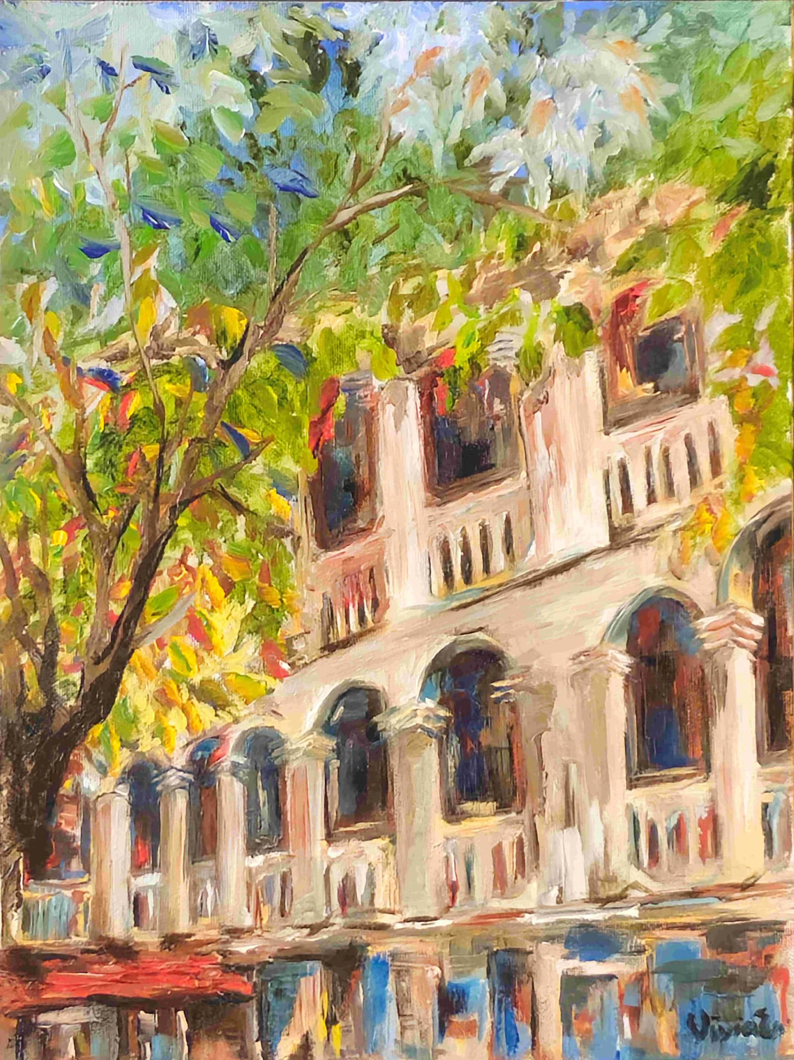Leafy branches partly screen the sunlit facade of the Institut des Beaux-Arts, with arched windows, pale columns and balconies